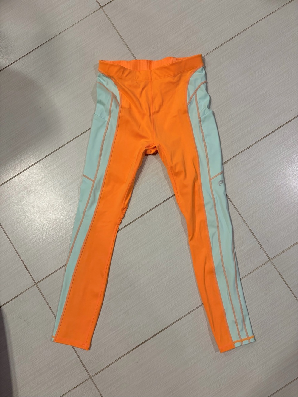 NWOT Fabletics High Waisted Florescent Orange and Aqua Colorblock Leggings